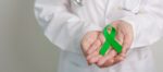 Doctor with green Ribbon for world Mental Health Day, Liver, Gal
