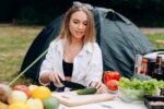 Woman preparing food outdoor in the camping